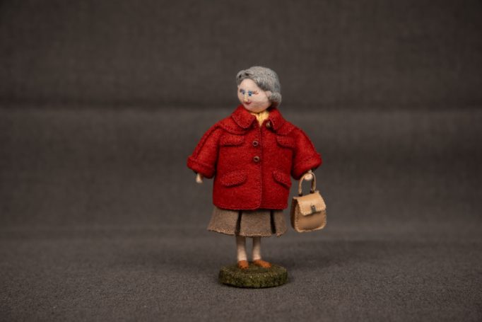 Winnie tries on the new coat